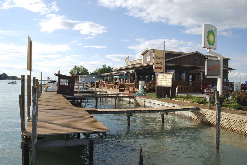 photo of a lakeside restaurant and gas station